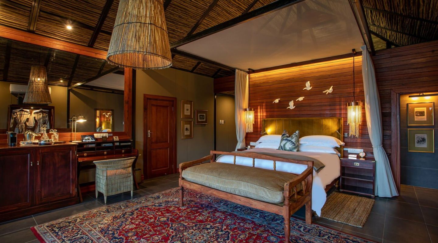 A bedroom at Mukwa River Lodge at Victoria Falls